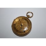 A HALLMARKED 18 CARAT GOLD OPEN FACED MANUAL WIND POCKET WATCH, being highly engraved throughout,