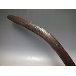 A LATE 19TH / EARLY 20TH CENTURY ABORIGINAL BOOMERANG, decorated with bands of cross hatch type