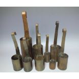 A COLLECTION OF FIVE ORIENTAL BRASS MEASURES, varying sizes, all with character marks, tallest H