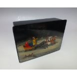 A 20TH CENTURY RUSSIAN BLACK LACQUERED PAPIER-MACHE BOX, the hinged lid painted with a troika scene,