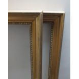 A PAIR OF LATE 19TH / EARLY 20TH CENTURY GILT PICTURE FRAMES, rebate 80 x 62 cm