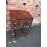 AN ANTIQUE WILLIAM AND MARY STYLE WALNUT BUREAU, with inlaid detail to the fall front and the top,