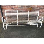 AN ANTIQUE WROUGHT IRON SCROLLWORK GARDEN BENCH, painted white, W 182 cm