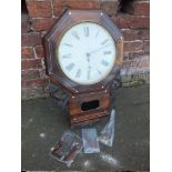 A LATE 19TH CENTURY ROSEWOOD WALLCLOCK, the enamel dial with painted numerals, typical carved fret