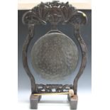 A CHINESE BRONZE GONG ON A CARVED HARDWOOD STAND, with striker, H 83.5 cm