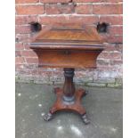 A WILLIAM IV ROSEWOOD SEWING BOX, the hinged lid opening to an empty interior, raised on a fluted