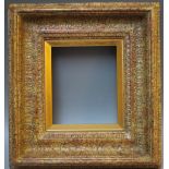 A 19TH CENTURY DECAPED GOLD FRAME, with oak leaves decoration, integral slip, frame W 7 cm, rebate