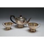 A HALLMARKED SILVER THREE PIECE TEA SERVICE BY HENRY CLIFFORD DAVIS - BIRMINGHAM 1931, approx