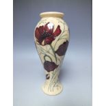 A MOORCROFT 'CHOCOLATE COSMOS' PATTERN SLENDER VASE, printed and painted marks to base, H 20.7 cm