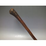 A LATE 19TH / EARLY 20TH CENTURY ABORIGINAL HARDWOOD ROOT THROWING CLUB, having incised grooves