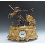 AM IMPRESSIVE BRASS FIGURAL MANTLE CLOCK, in the form of Boudica on a chariot with two rearing