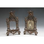 A PAIR OF ORNATE PIERCED METAL EASEL BACKED PHOTO FRAMES, Rd No 459551, H 34 cm