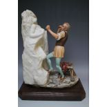A LARGE CAPO DI MONTE LIMITED EDITION FIGURE OF MICHELANGELO CARVING A FIGURE OUT OF MARBLE, on
