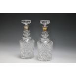 A PAIR OF HALLMARKED SILVER COLLARED DECANTERS - LONDON 1977, H 28 cm