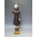 ANTIQUE PAINTED WOODEN MANNEQUIN OF A BEARDED MAN WITH PAINTED EYES, raised on a wooden block, H