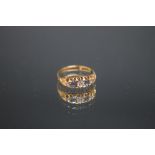 A HALLMARKED 18 CARAT GOLD SAPPHIRE AND DIAMOND FIVE STONE RING, ring size O