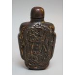 A 19TH CENTURY CARVED RHINO HORN OPIUM / SNUFF BOTTLE, with carved mythical dragons, H 9 cm