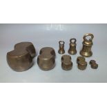 A COLLECTION OF FIVE GRADUATED CHINESE BRASS / BRONZE WEIGHTS, each with engraved character marks,