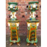 A PAIR OF LARGE AND IMPRESSIVE 20TH CENTURY MAJOLICA JARDINIERE AND STANDS, with mask and swag