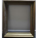 A 19TH CENTURY GOLD FRAME, rebate size 67 x 56 cm, width of frame 10 cm