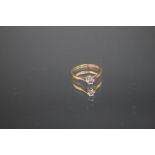 AN OLD CUT DIAMOND SOLITAIRE RING, the diamond being approx 0.20 carat, ring size L