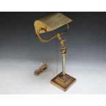 A HEAVY BRASS ADJUSTABLE BANKERS LAMP, on a stepped square base, H 40 cm