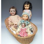 A COLLECTION OF VINTAGE DOLLS AND CLOTHING ETC., to include a miniature bisque headed doll with