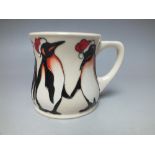 A MOORCROFT 'PENGUIN PARTY' PATTERN MUG, printed and painted marks to base, H 8.5 cm