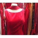 A SELECTION OF LADIES WEAR, various styles comprising dresses, suits and separates, mainly red, to