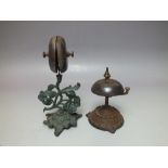 TWO VINTAGE RECEPTION / DESK BELLS, comprising a brass and cast example with side strike mechanism