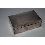 A HALLMARKED SILVER CIGARETTE BOX - BIRMINGHAM 1928, W 14 cm