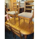 A HONEY PINE 'DUCAL' EXTENDING TABLE WITH SIX CHAIRS TABLE W 90 CM L 1090 CM (EXTENDED)