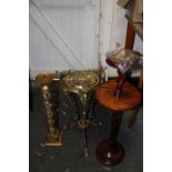 A PIERCED BRASS PLANT STAND, MODERN METAL CANDLE STICK AND AN OAK BARLEYTWIST STAND