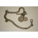 A HALLMARKED SILVER ALBERT CHAIN WITH COIN FOB