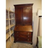 AN ANTIQUE MAHOGANY BUREAU BOOKCASE H 228 W 104 CM