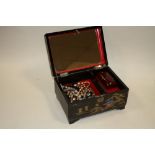 A ORIENTAL STYLE JEWELLERY BOX AND CONTENTS