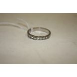 A SEVEN STONE DIAMOND HALF ETERNITY RING, ring size Q 1/2