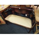 AN EDWARDIAN MAHOGANY SALON SETTEE W 118 CM S/D