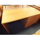 A MODERN LIGHT OAK DESK WITH MATCHING FILING CABINET (2)