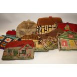 A COLLECTION OF VINTAGE COTTAGE THEMED TEA COSIES, comprising mostly embroidered examples together