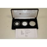 A SET OF THREE SILVER PROOF QEII 90TH BIRTHDAY COINS