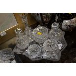 A HEAVILY CUT GLASS PART DRESSING TABLE SET ON TRAY
