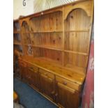 A MODERN HONEY PINE LARGE DISPLAY CABINET H 189 W 173 CM