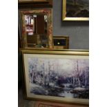 A GILT FRAMED BEVEL EDGED MIRROR TOGETHER WITH ANOTHER, LARGE GILT FRAMED PRINT ETC