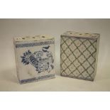 TWO ORIENTAL CERAMIC PILLOWS, of typical form in mainly blue and white, H 13.75 cm