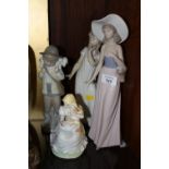 A COALPORT 'THE GOOSE GIRL' FIGURE TOGETHER WITH A LARGE NAO LADY FIGURE AND TWO OTHERS (4)