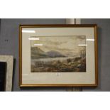 A FRAMED AND GLAZED WATERCOLOUR DEPICTING SHEEP GRAZING IN A HIGHLAND LOCH SCENE SIGNED JOHN