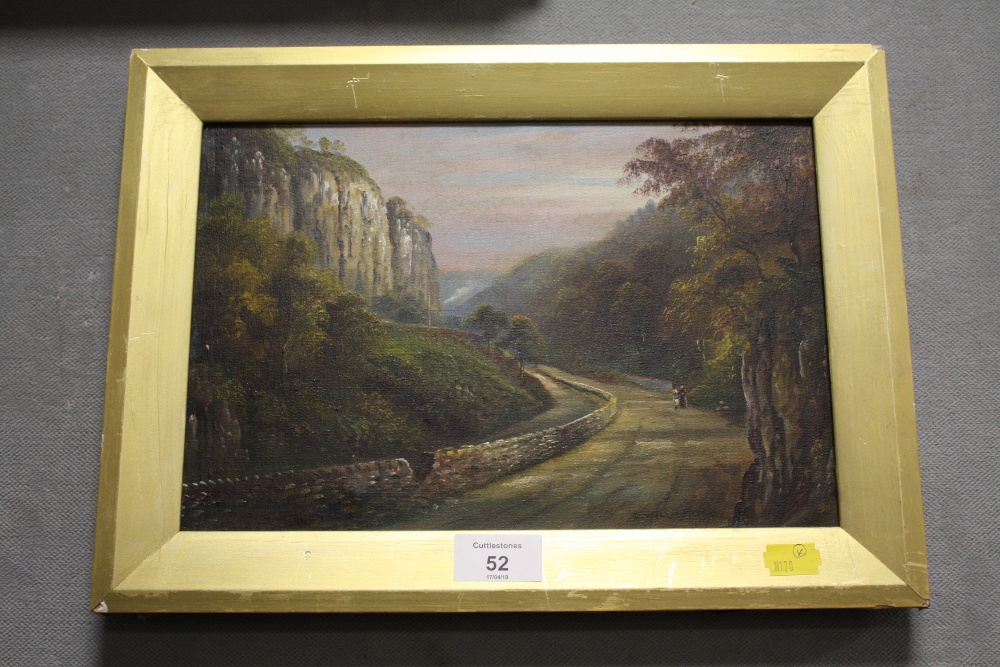 A FRAMED OIL ON CANVAS DEPICTING A WOODED LANDSCAPE WITH FIGURES ON THE ROAD BY G WILLIS PRYCE