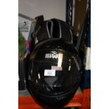 A BLACKLINE MOTORCYCLE HELMET WITH CARRY BAG