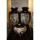 A PAIR OF JAPANESE FIGURATIVE CERAMIC VASES TOGETHER WITH A MATCHING TWIN HANDLED LIDDED BOWL (3)